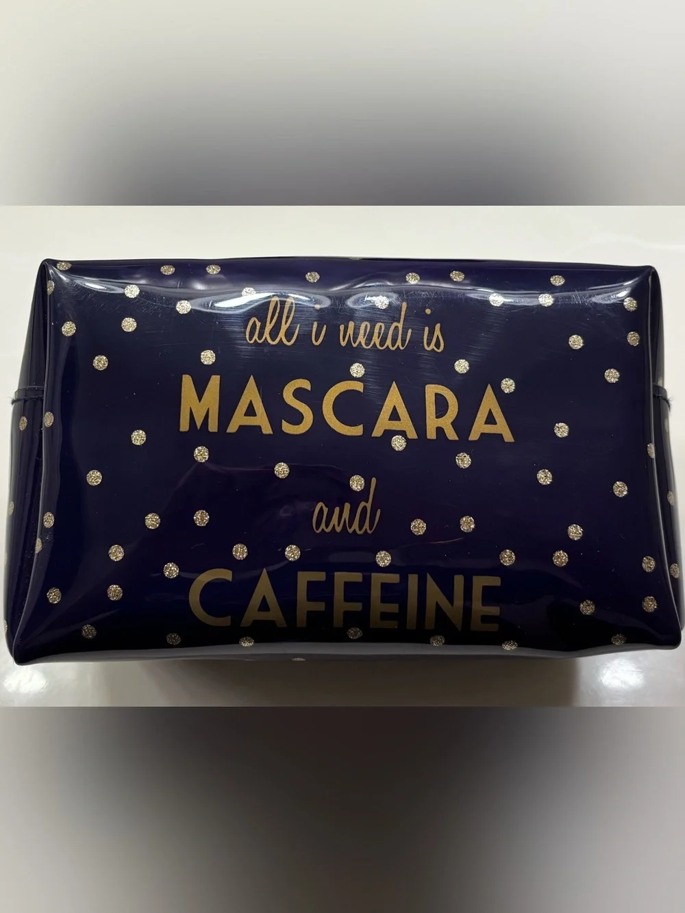 Glossy polka dot makeup bag